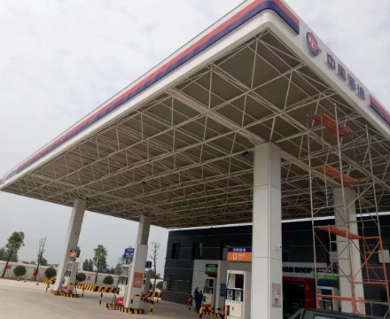 Gas station space frame roof